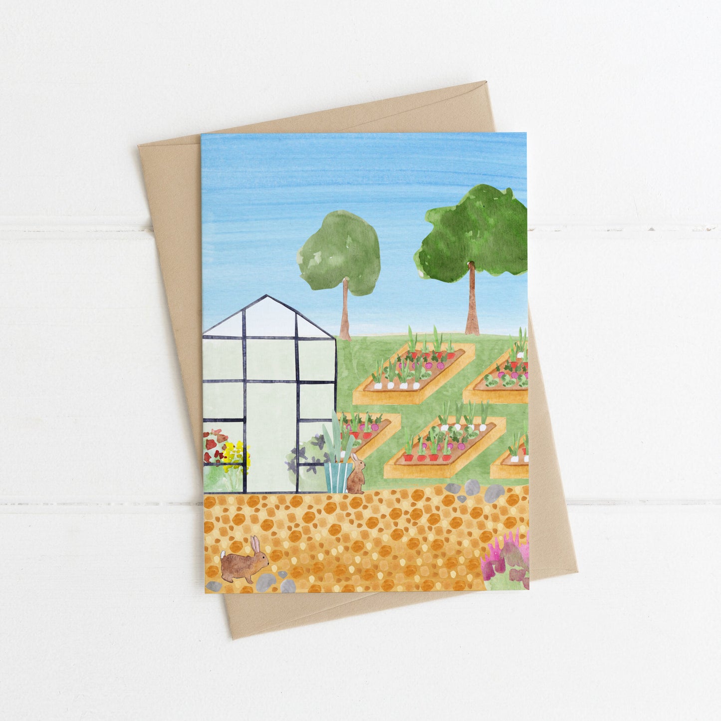 Rabbits in the vegetable garden greeting card